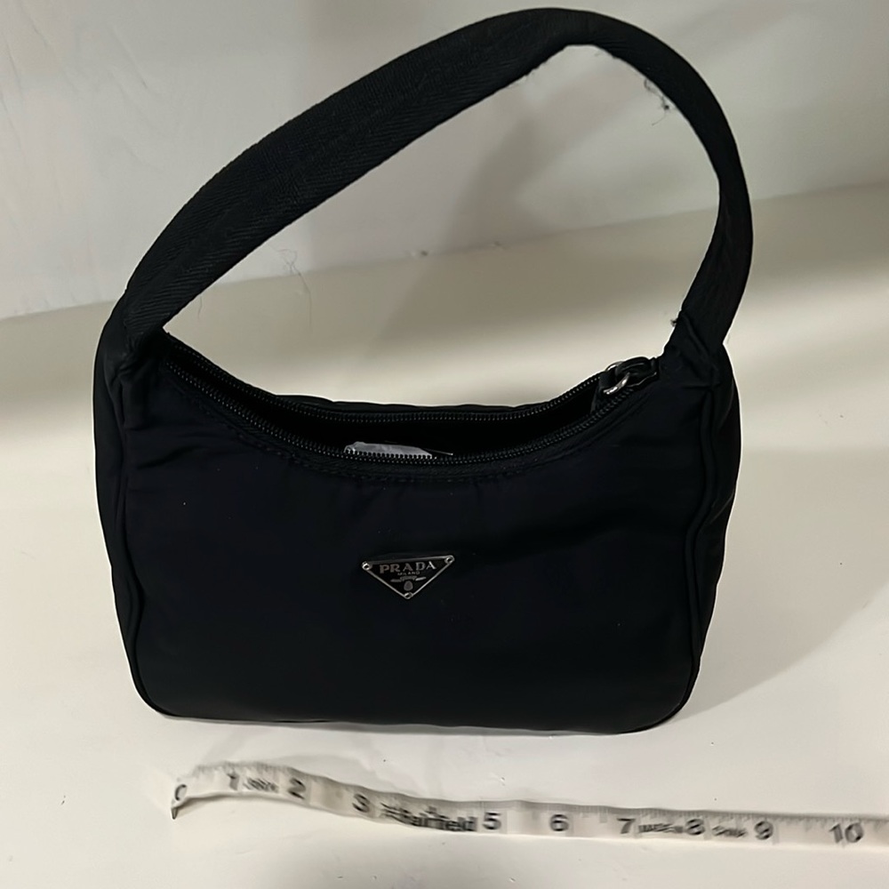 EUC Prada Re-vinyl mini bag. No marks or scuffs, barely used.